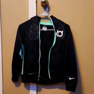Boys or girls zip up Nike jacket like brand new .In very good condition.